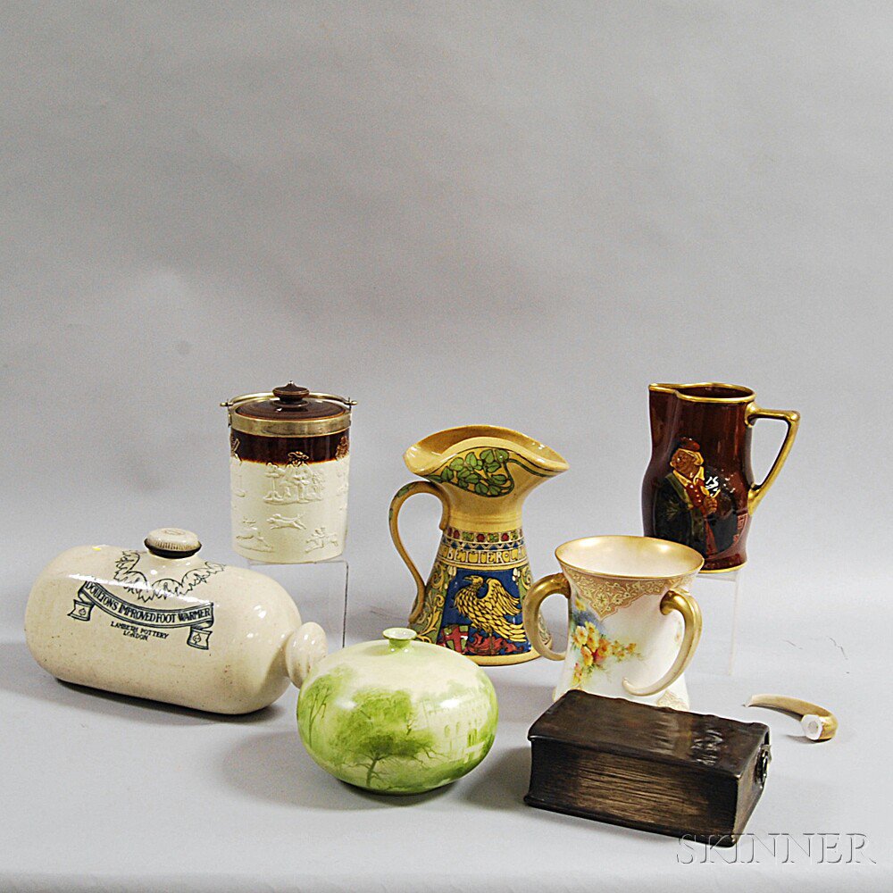 Appraisal: Seven Doulton Stoneware Items a cobalt-decorated Doulton Lambeth footwarmer an