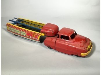 Appraisal: A vintage Wyandotte pressed tin and lithographed decorated fire truck