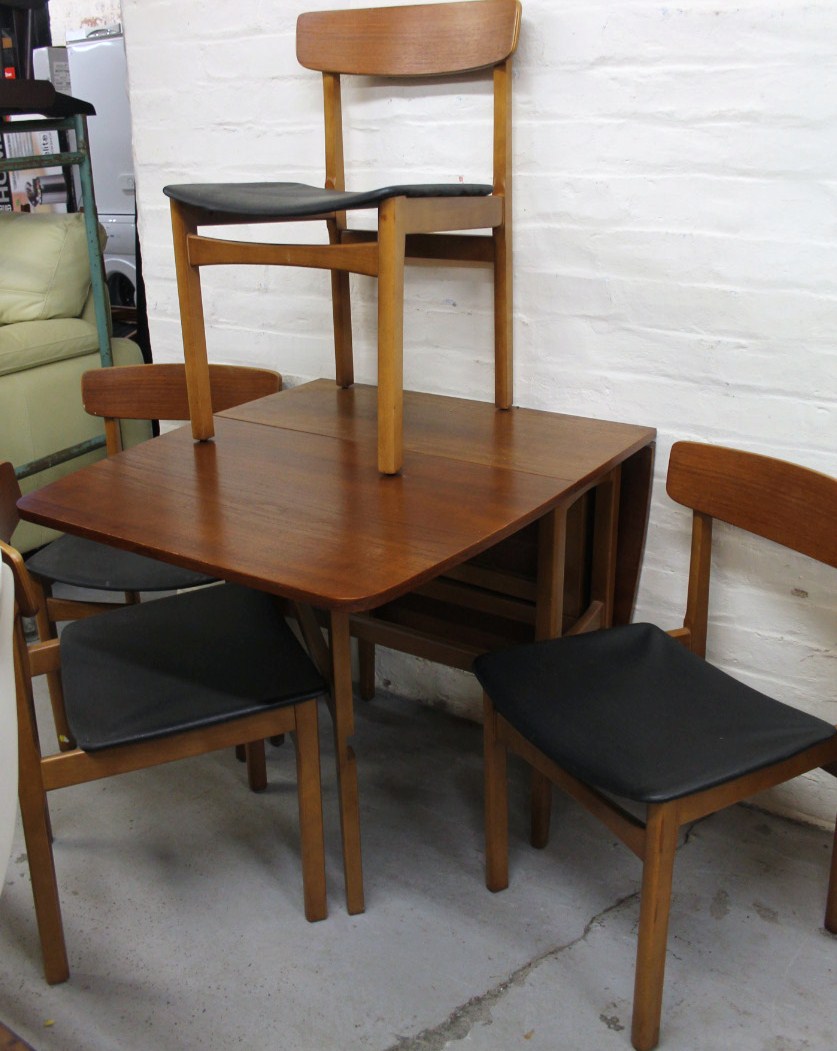 Appraisal: A 's teak dining room suite comprising dropleaf table and