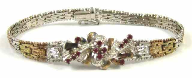 Appraisal: RUBY AND FOURTEEN KARAT GOLD BRACELET The yellow white and