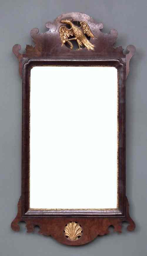 Appraisal: A mahogany framed rectangular wall mirror of th Century design