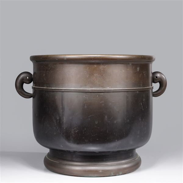 Appraisal: Japanese cylindrical form bronze Hibachi with comma handles and inlaid