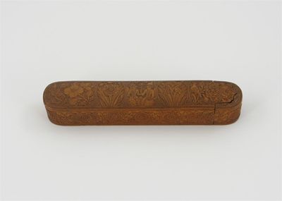 Appraisal: An Indian carved wood pen case decorated with panels of