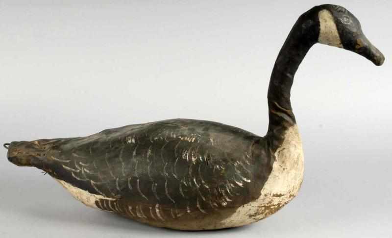 Appraisal: Leather Covered Goose Decoy Description Signed illegibly on bottom One-inch