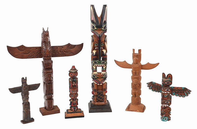 Appraisal: Six Northwest Coast Totems th century including three polychrome decorated