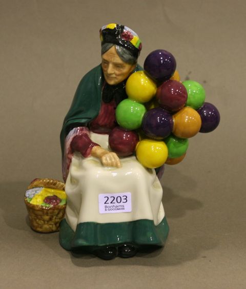 Appraisal: A Royal Doulton figurine 'The Old Balloon Seller' HN