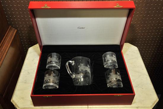 Appraisal: CARTIER BEVERAGE SET French th century Crystal glasses and pitcher