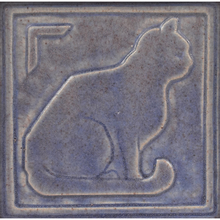 Appraisal: Pewabic tile cat figure covered in a purple matte glaze