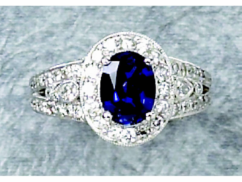 Appraisal: SAPPHIRE AND DIAMOND RING k white gold ring set with