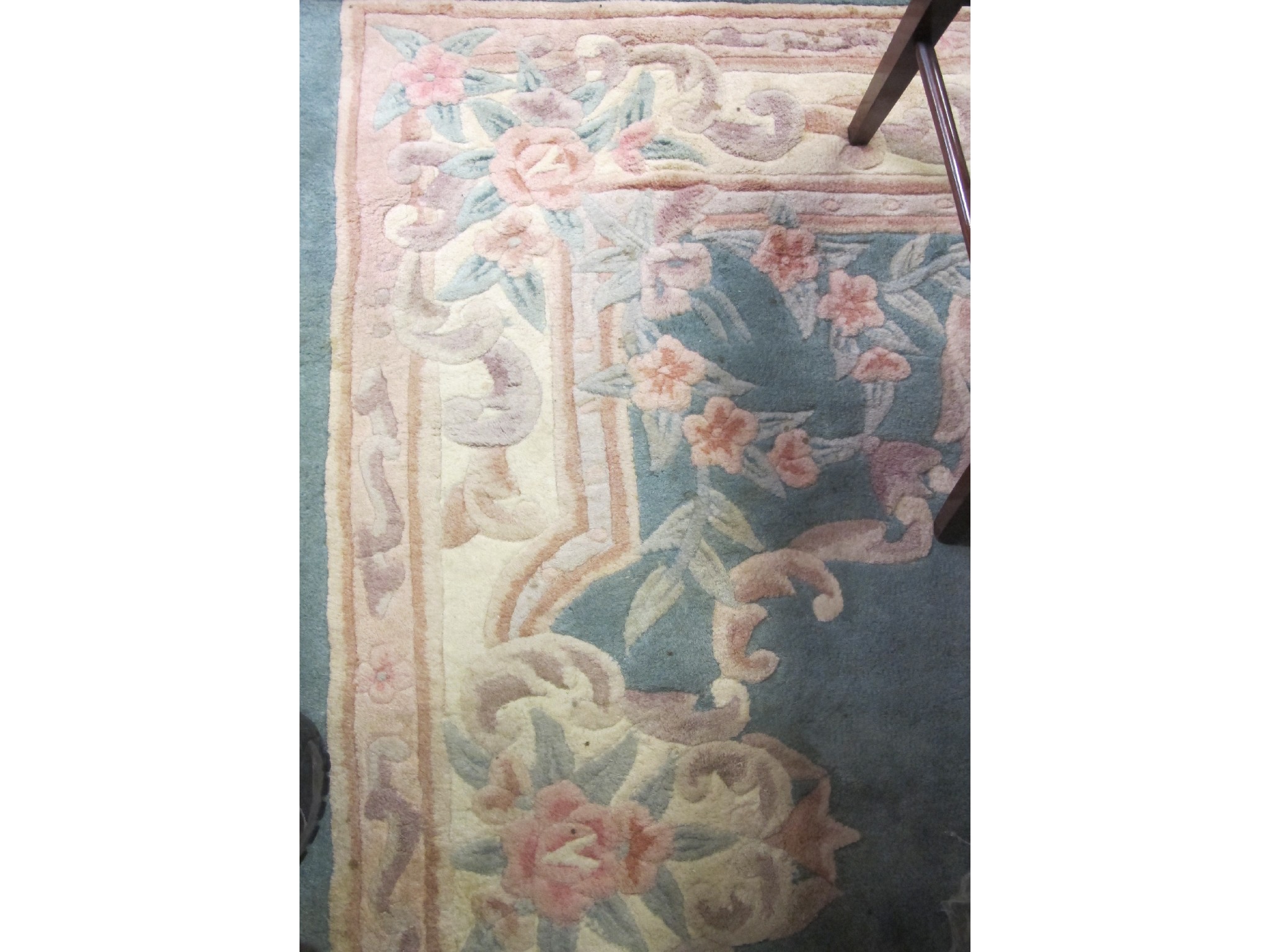 Appraisal: Chinese rug on cream and green ground x cm