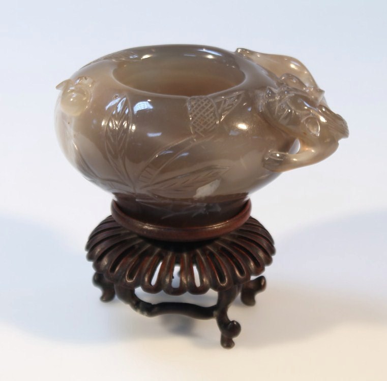 Appraisal: A polished Chinese brown jadeite style bowl the squat body