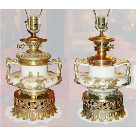 Appraisal: Companion Pair of Royal Worcester Style Gilt-Metal Mounted Porcelain Lamps