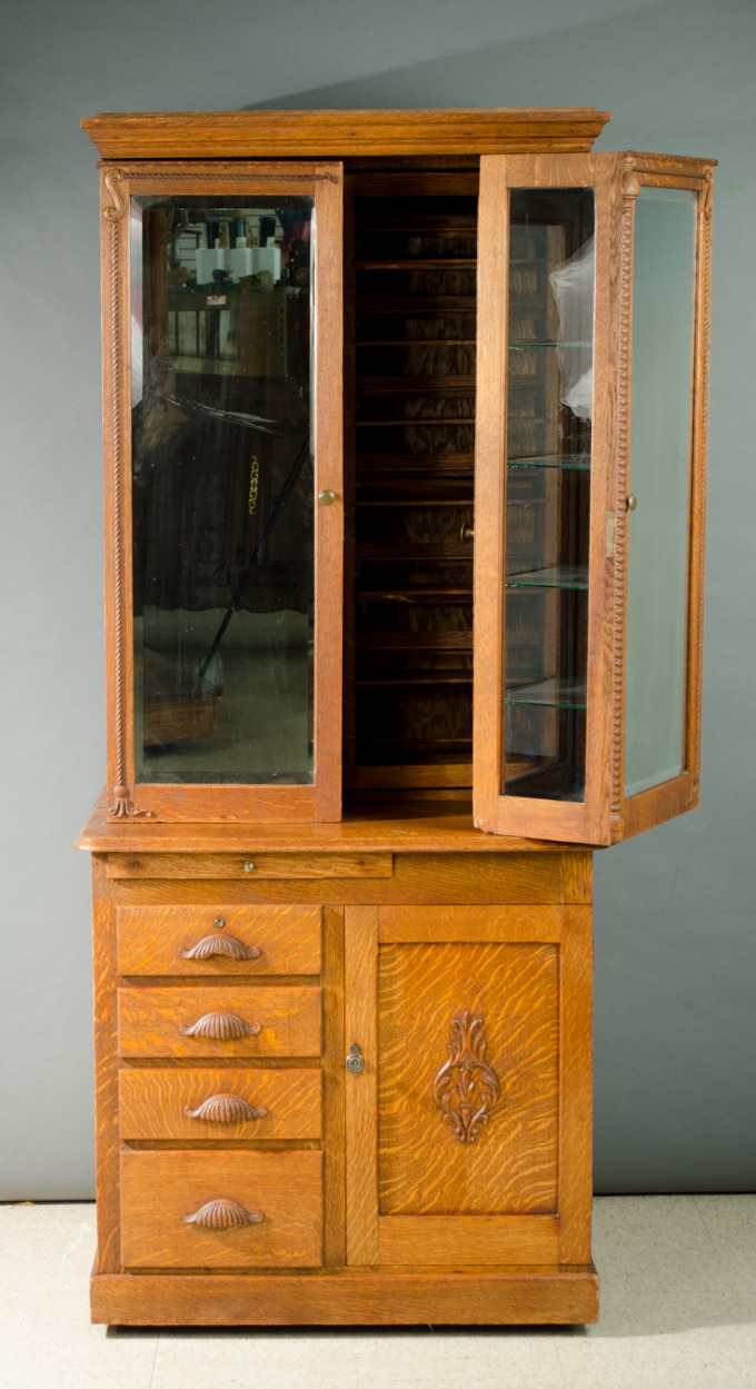 Appraisal: A RARE OAK DOCTOR'S CABINET attributed to the W D