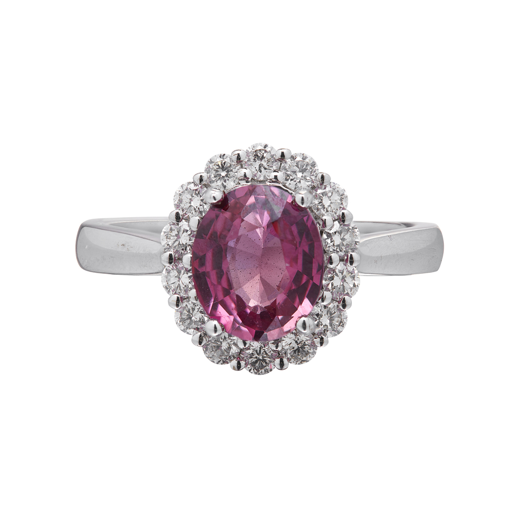 Appraisal: A pink sapphire and diamond set cluster ring claw set