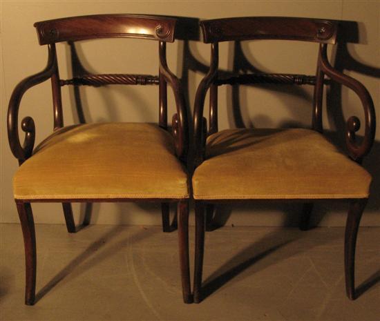 Appraisal: Pair of th century mahogany rail back open dining armchairs