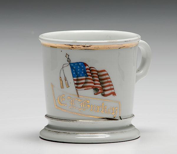 Appraisal: AMERICAN FLAG SHAVING MUG porcelain with polychrome painted scene of