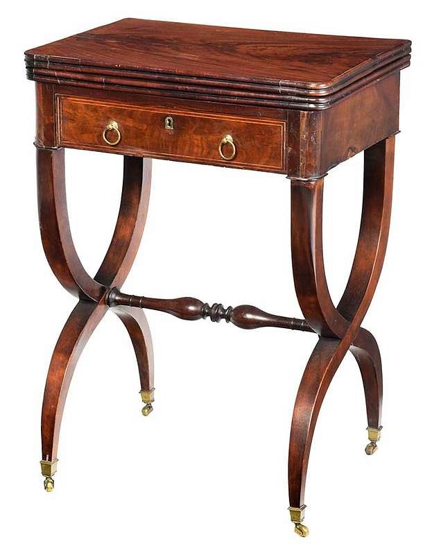 Appraisal: Classical Figured Mahogany Table Continental th century curule legs with