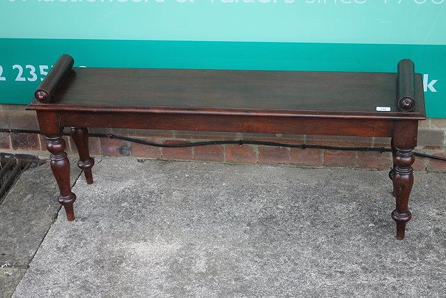 Appraisal: A MID TH CENTURY MAHOGANY WINDOW SEAT on turned supports