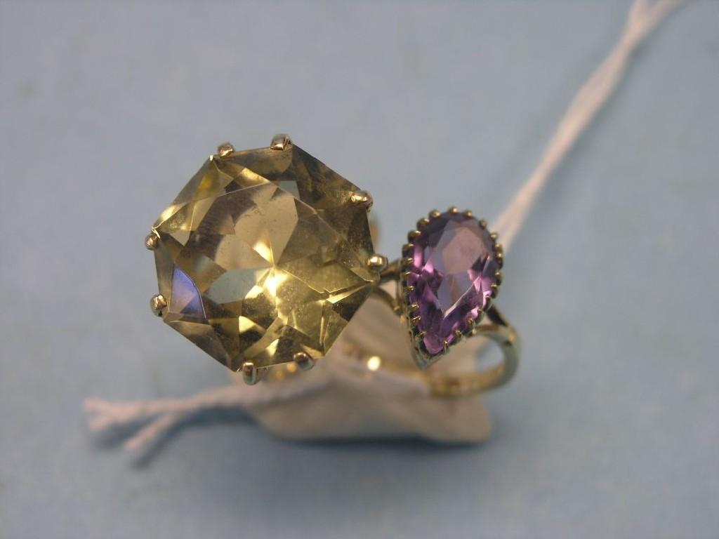 Appraisal: A large ct gold dress ring claw-set with faceted citrine