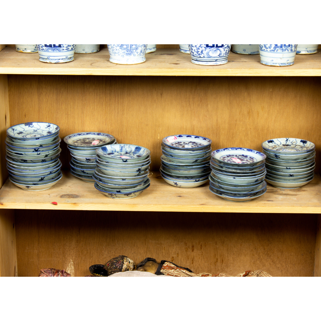 Appraisal: SHELF OF CHINESE BLUE AND WHITE DISHES Shelf of Chinese