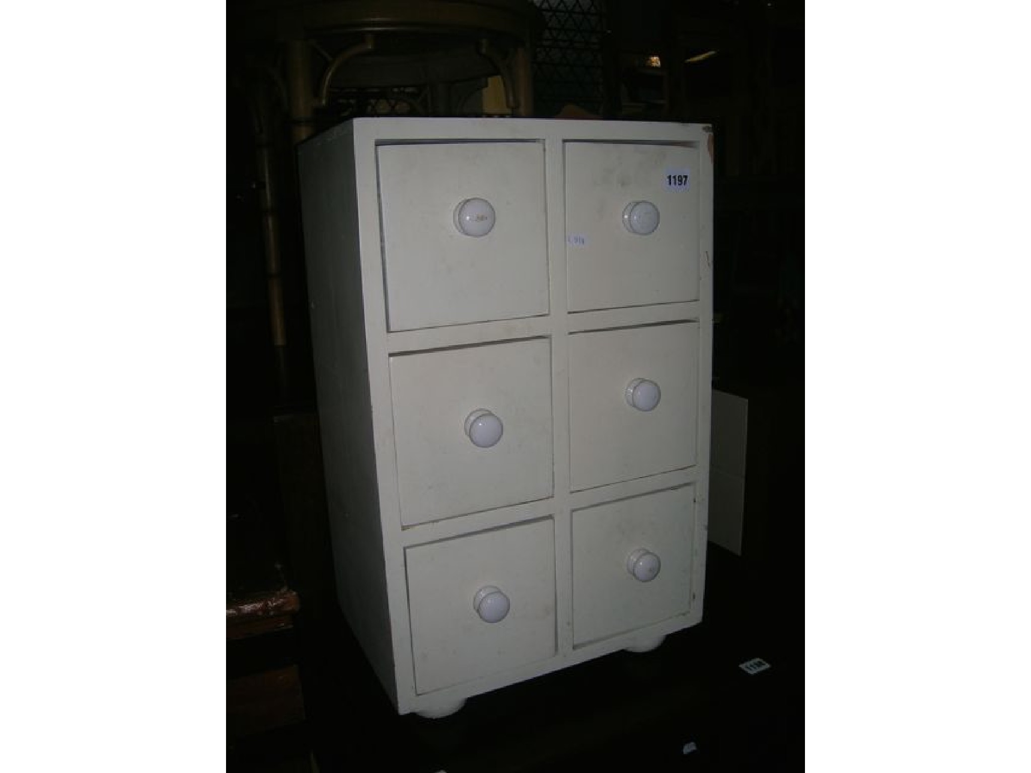 Appraisal: A small painted pine nest of six drawers with white