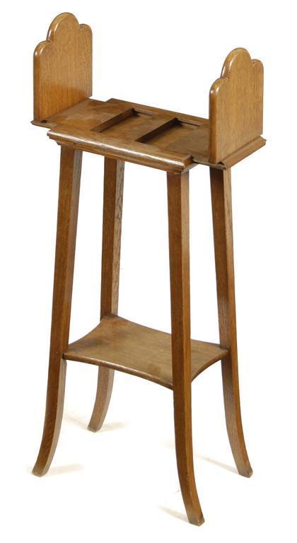 Appraisal: An oak bookstand by Edwards amp Sons