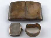 Appraisal: Silver A hip shaped silver cigarette case with double lid