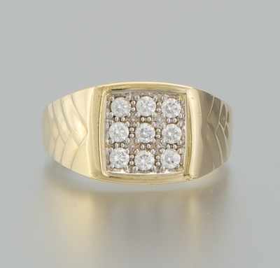 Appraisal: A Gentleman's Diamond Ring k yellow gold ring featuring nine