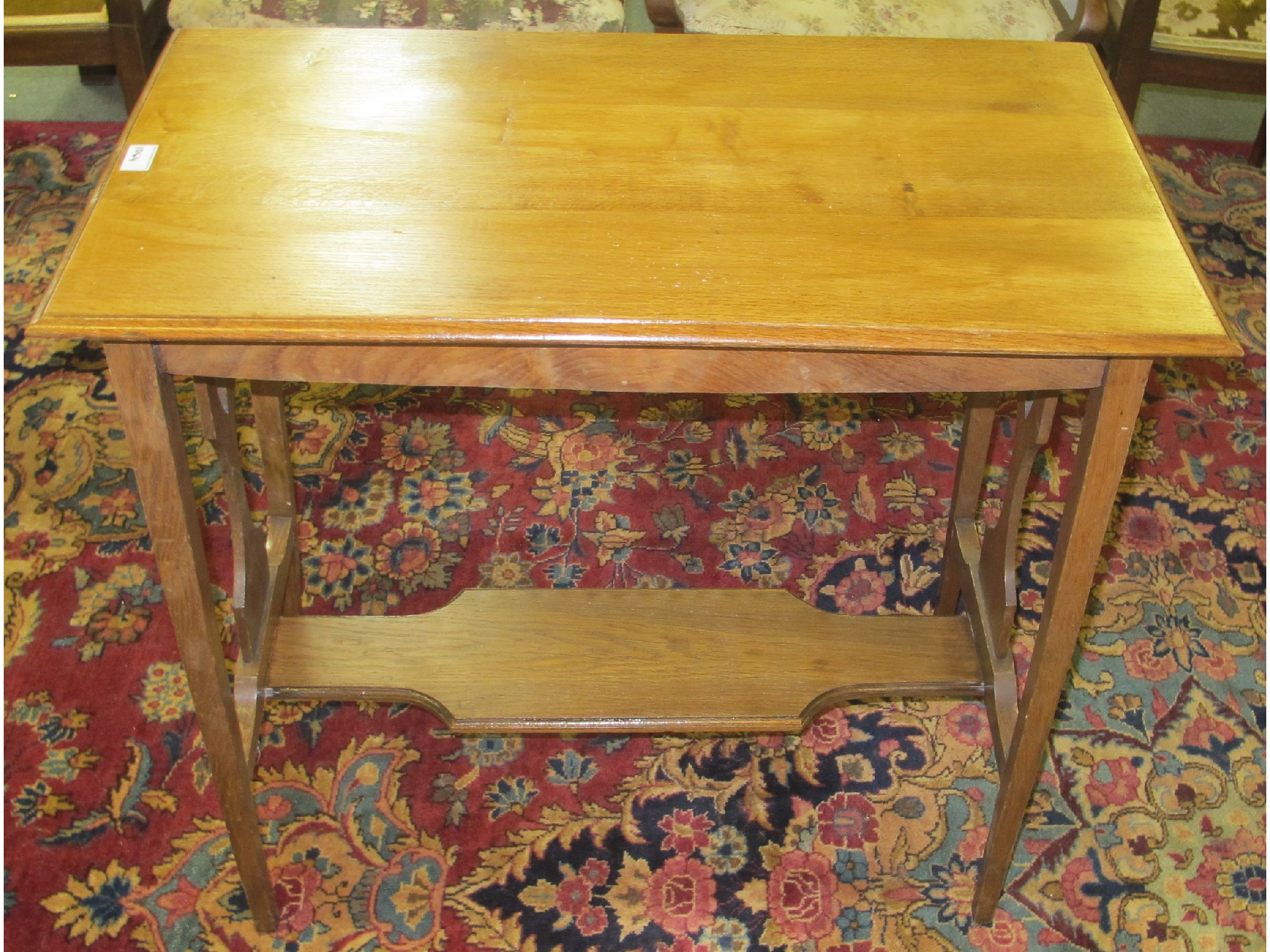 Appraisal: An oak two tier side table and a mirror