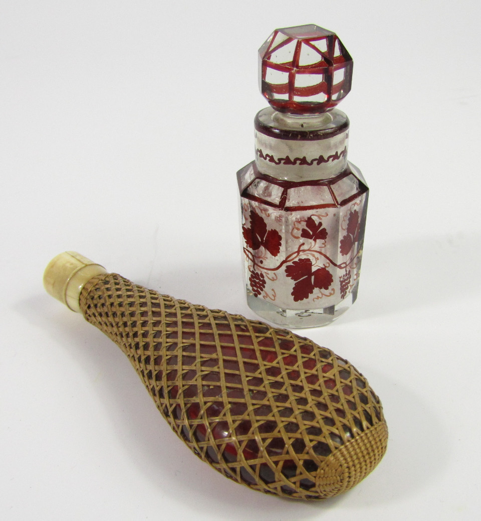 Appraisal: A Victorian cranberry glass scent bottle of teardrop form with