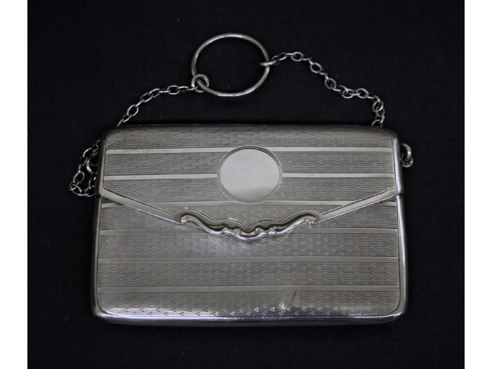 Appraisal: Early th century silver purse on a chain with engine