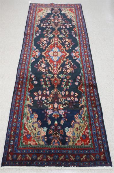 Appraisal: SEMI-ANTIQUE PERSIAN MEHRIVAN AREA RUG northwestern Iran floral and central