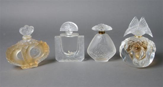 Appraisal: A Collection of Four Lalique Perfume Bottles Height of tallest