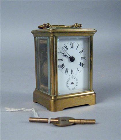 Appraisal: Small French brass striking carriage clock The rectangular case with