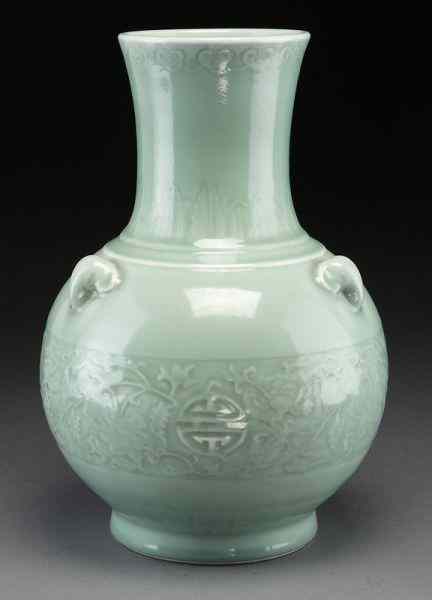 Appraisal: Chinese celadon porcelain vasewith sheep's head handles the body with