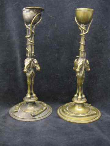 Appraisal: Pair of Equestrian Brass Candlesticks horsehead horseshoe riding cap decor