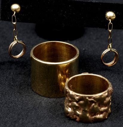 Appraisal: Two Rings Each marked k Together with a pair of