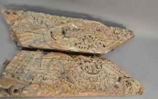 Appraisal: Pair of carved Indian temple architectual carvings ht in lg