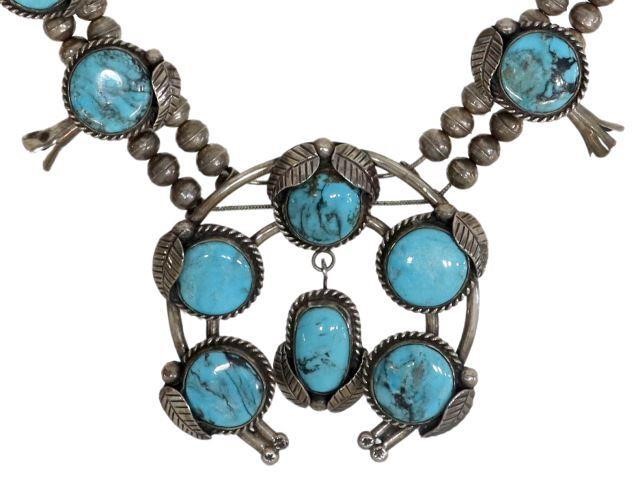 Appraisal: Native American silver content unknown and turquoise squash blossom necklace