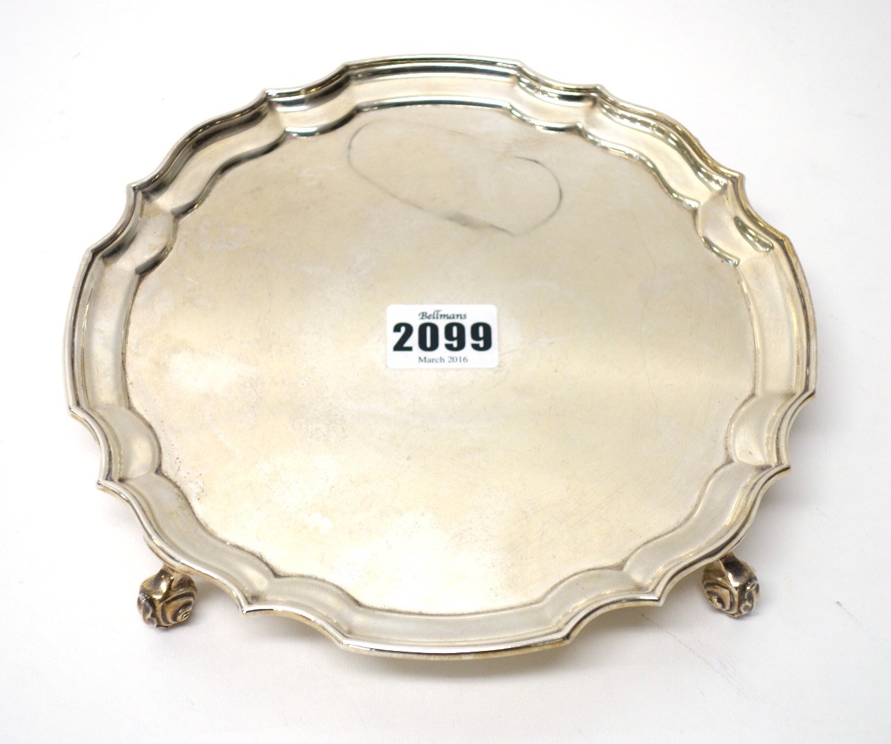 Appraisal: A silver salver of shaped circular form decorated with a