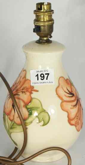 Appraisal: Moorcroft Lamp Base decorated with Hibiscus on a Green Background