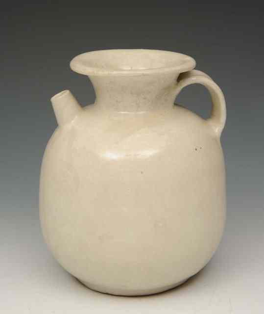 Appraisal: A CHINESE WHITE GLAZED TANG DYNASTY EWER of plain form