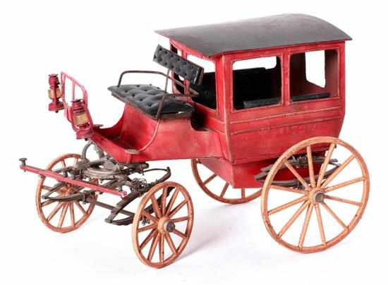 Appraisal: Painted metal carriage model early th century fully functioning coach