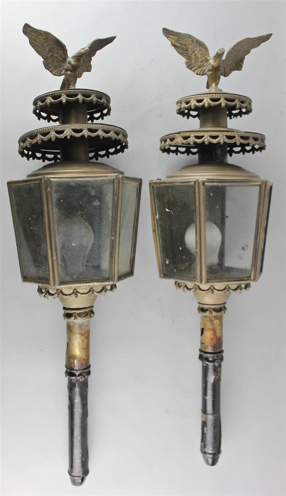 Appraisal: PAIR OF GEORGE III STYLE BRASS CARRIAGE LANTERNS SURMOUNTED BY