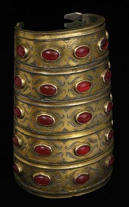 Appraisal: LARGE PERSIAN SILVER-GILT AND GLASS CUFF in Provenance Property from