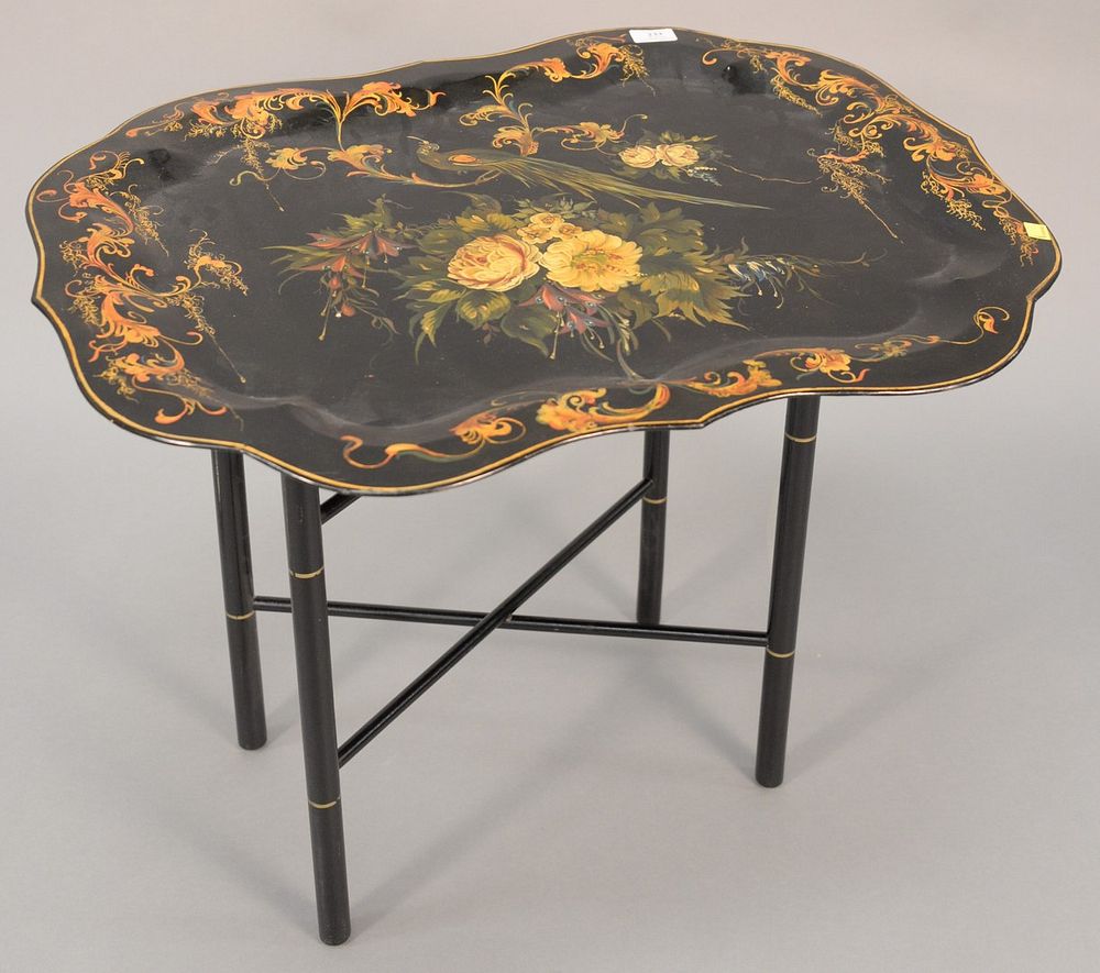 Appraisal: Paint decorated tole tray with painted tole tray on stand