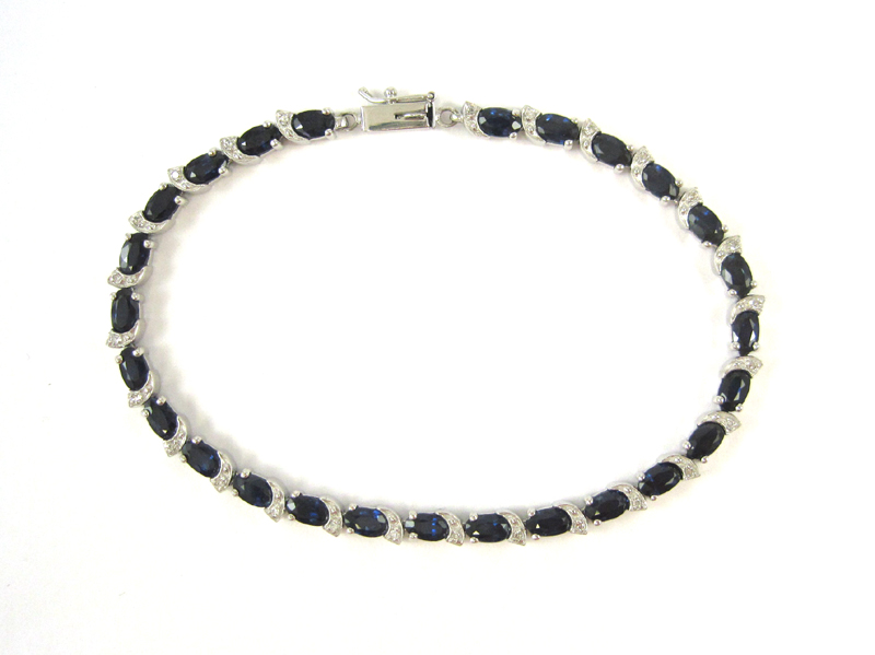 Appraisal: SAPPHIRE AND FOURTEEN KARAT WHITE GOLD BRACELET with appraisal The