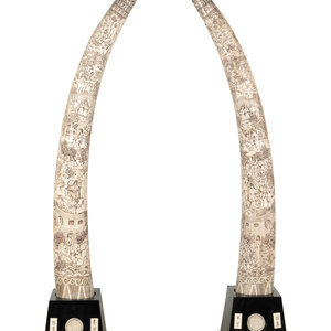 Appraisal: A Pair of Large Carved Bone Veneered Models of Tusks