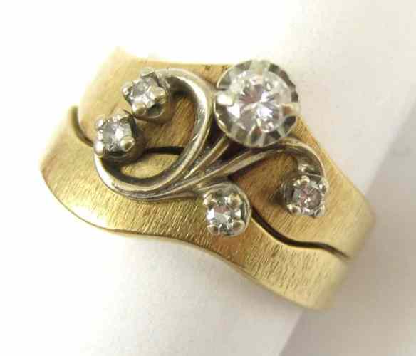 Appraisal: DIAMOND AND FOURTEEN KARAT GOLD RING SET set with five