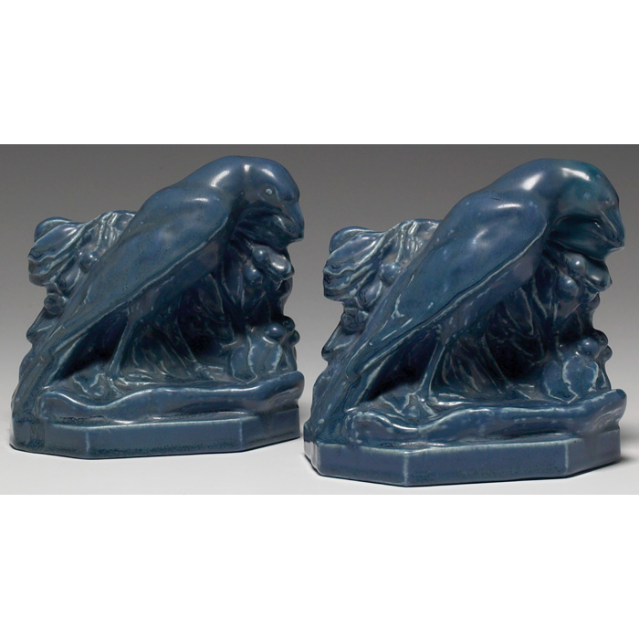 Appraisal: Rookwood bookends pair rook in front of leaves and berries